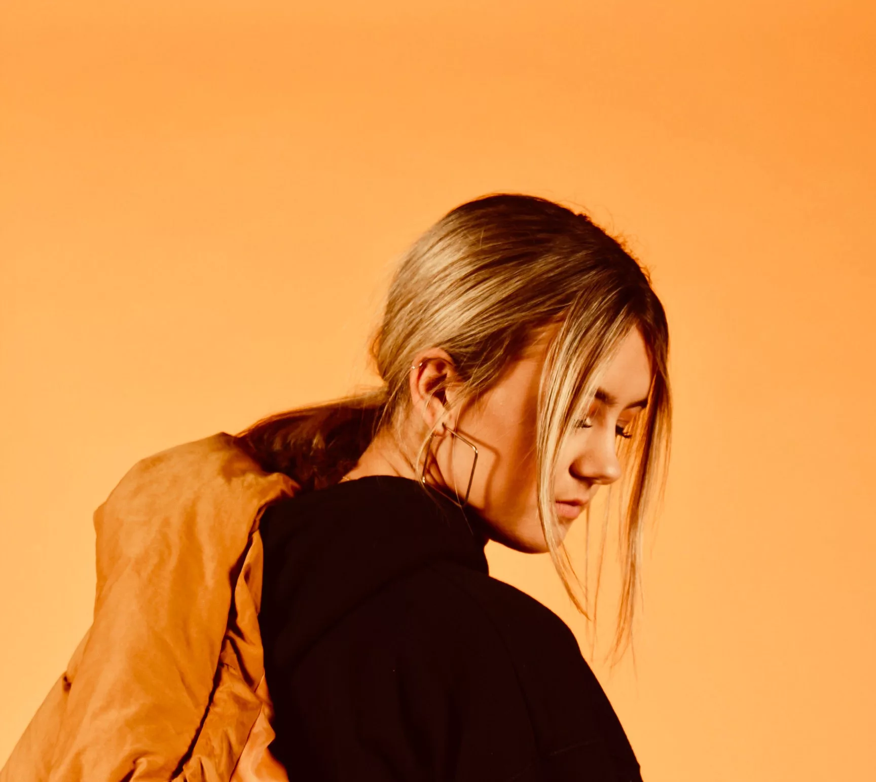 Yellow background image of a woman